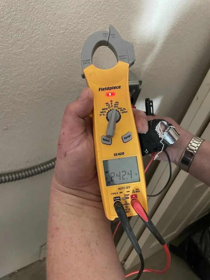 Voltage testing with clamp meter during Outlet Installation in Elverta
